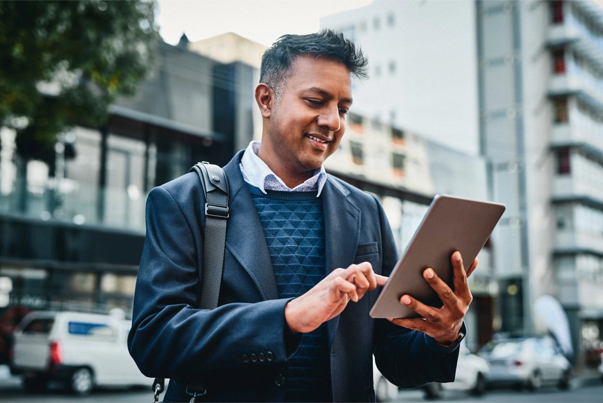 man holding a tablet